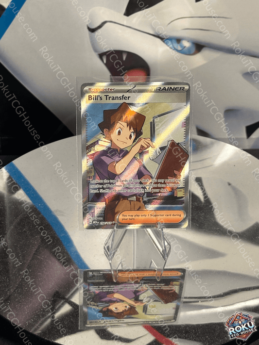 Bill's Transfer Pokémon card SV: 151 in near mint condition displayed on a stand.