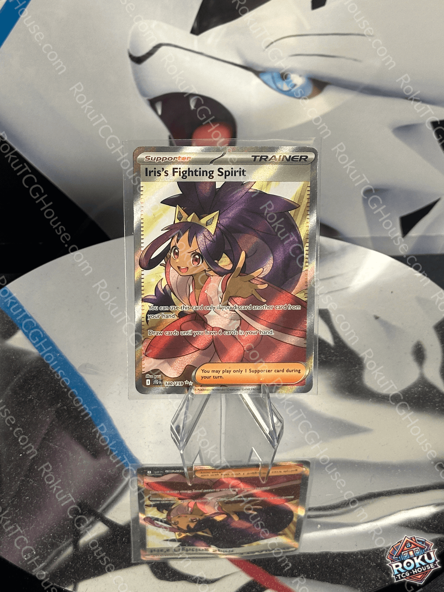 Iris's Fighting Spirit Pokemon card in Near Mint condition displayed against a sleek background.