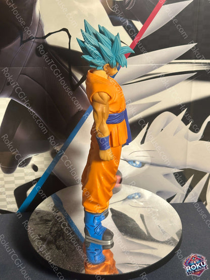 Super Saiyan Blue Goku Dragon Ball Super Figure in profile view, showcasing vibrant blue hair and orange outfit.