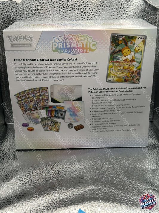 Prismatic Evolutions - Pokemon Center Elite Trainer Box *Small Rip*