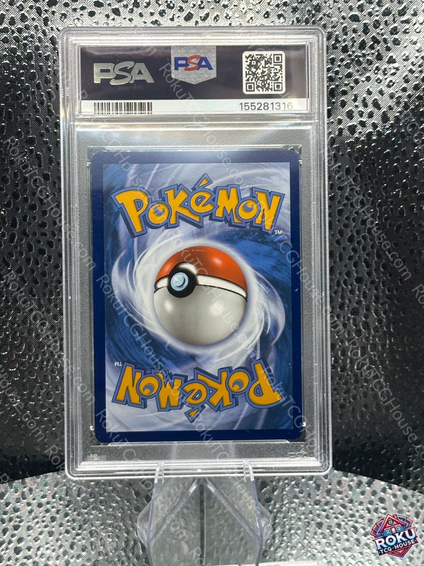 Back view of a PSA graded Pokemon card featuring the iconic Pokeball design.