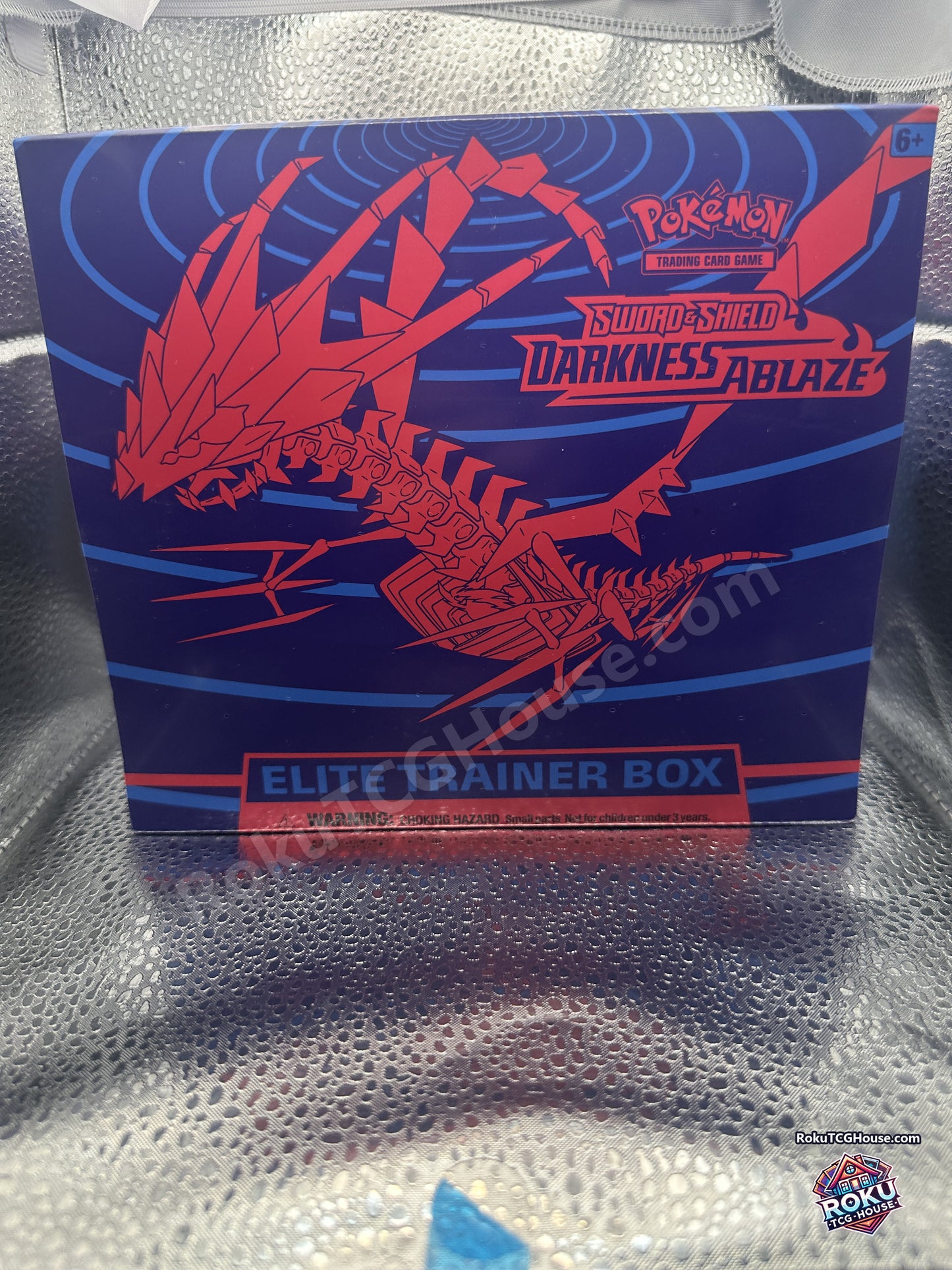 Sealed Pokemon Sword and Shield Darkness Ablaze Elite Trainer Box, front of the box showing Eternatus