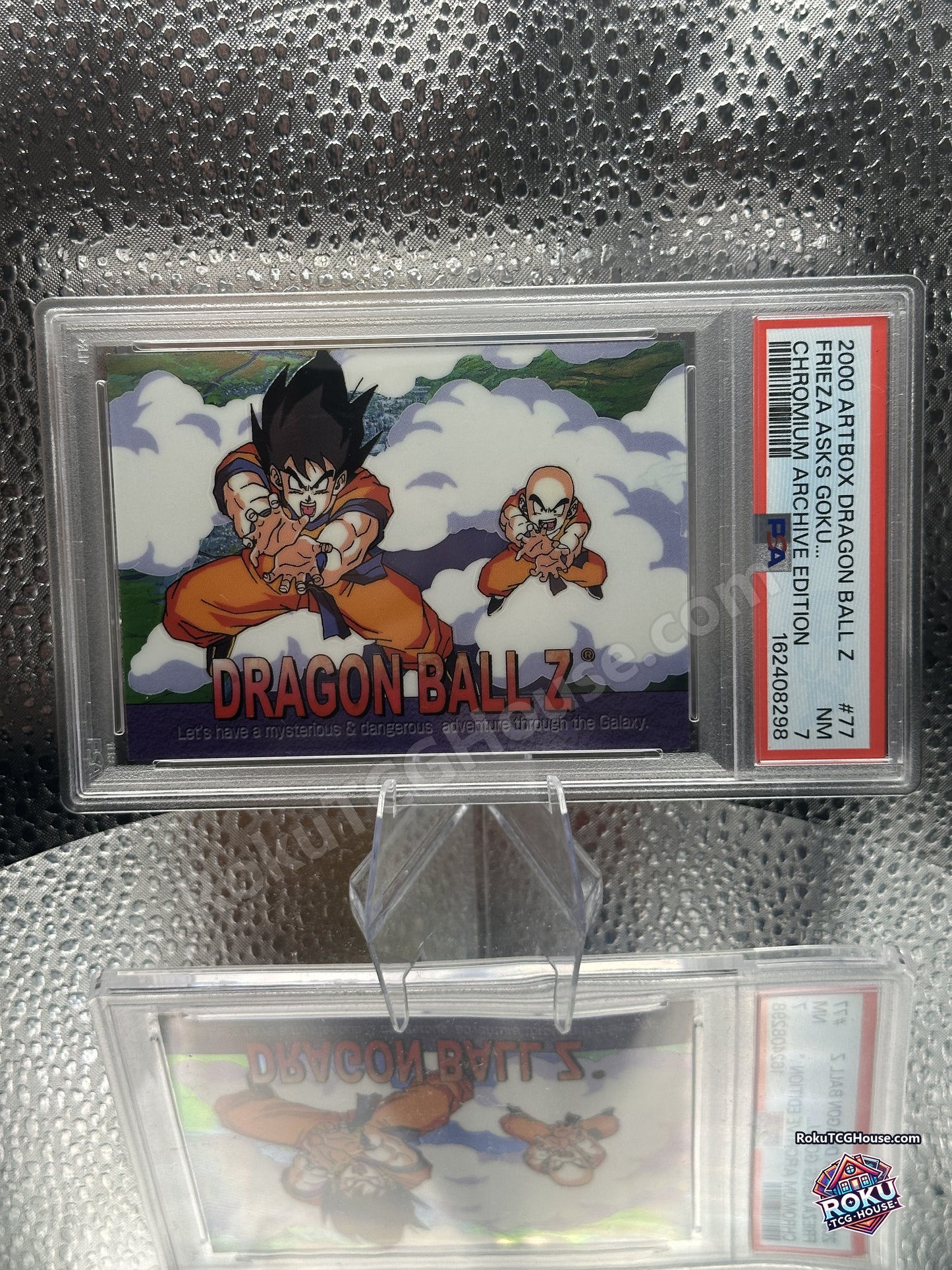 Angled view of the PSA 7 slab showing the chromium finish on Goku and Krillin