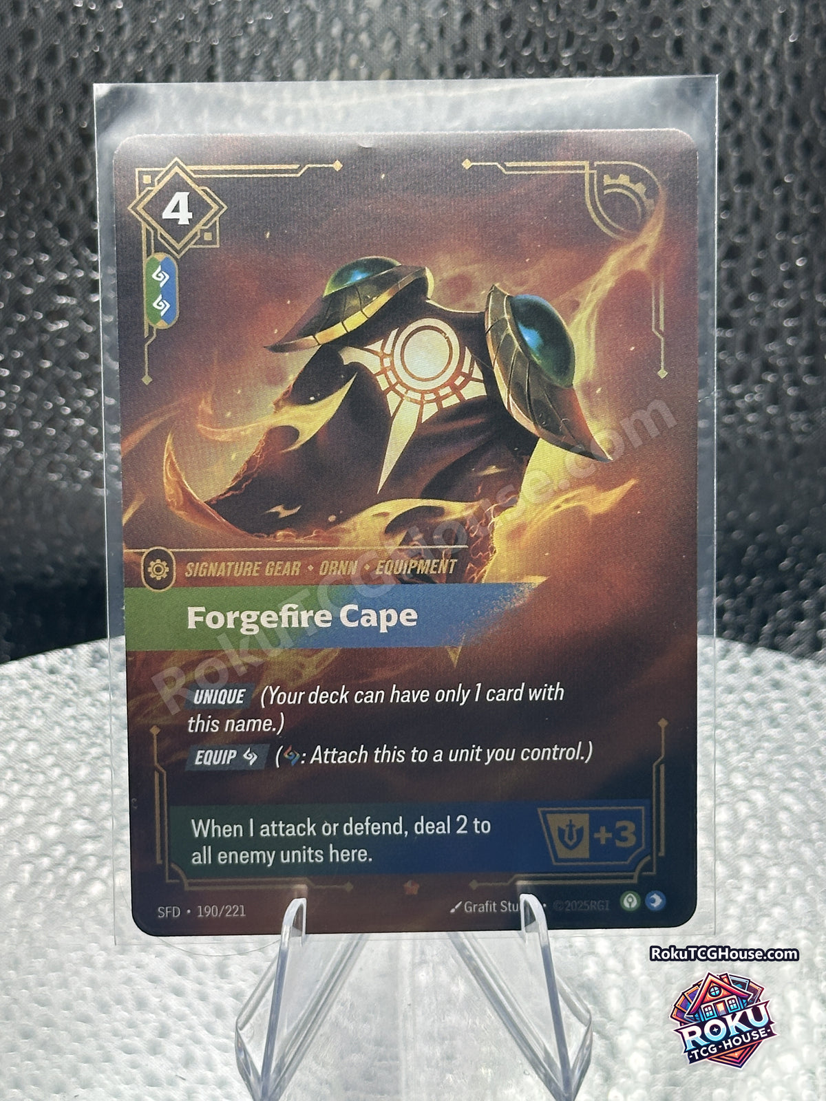 Forgefire Cape 190/221 Riftbound Spiritforged signature gear card front