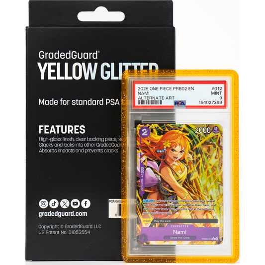 GradedGuard Yellow Glitter retail box beside a Yellow Glitter case holding a PSA 9 One Piece Nami alternate art slab